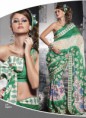 GREEN/OFF WHITE FAUX CREPE DESIGNER SAREE WITH GRACIOUS PATTI WORK